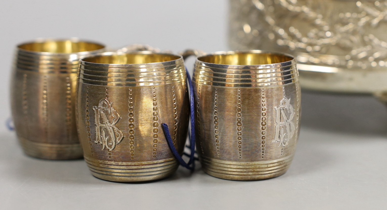 Eight assorted French white metal items including pair of gilded beakers on stands, by Puiforcat, Paris, a bowl by Armand Gross and three barrel shaped cups, by Fizaine, 12.9oz.